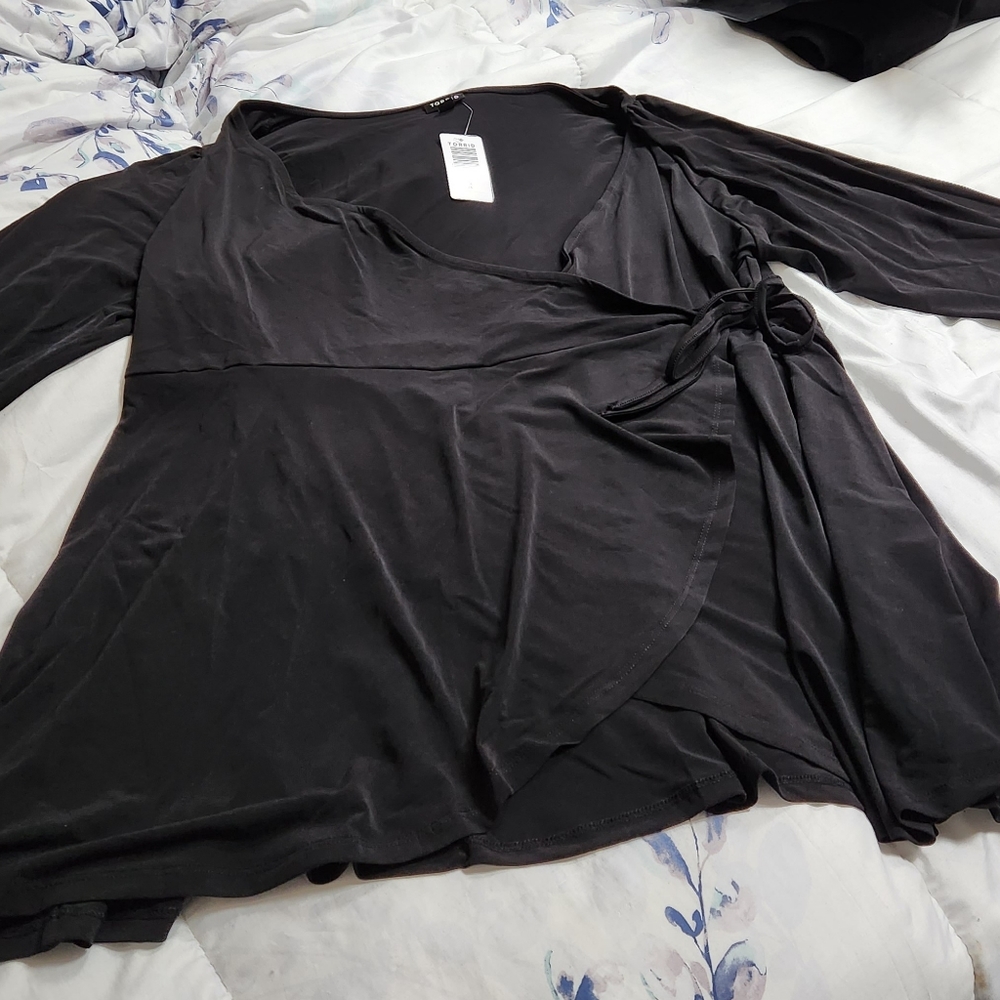 Brand new, never worn,Torrid wrap blouse size 4x  Black